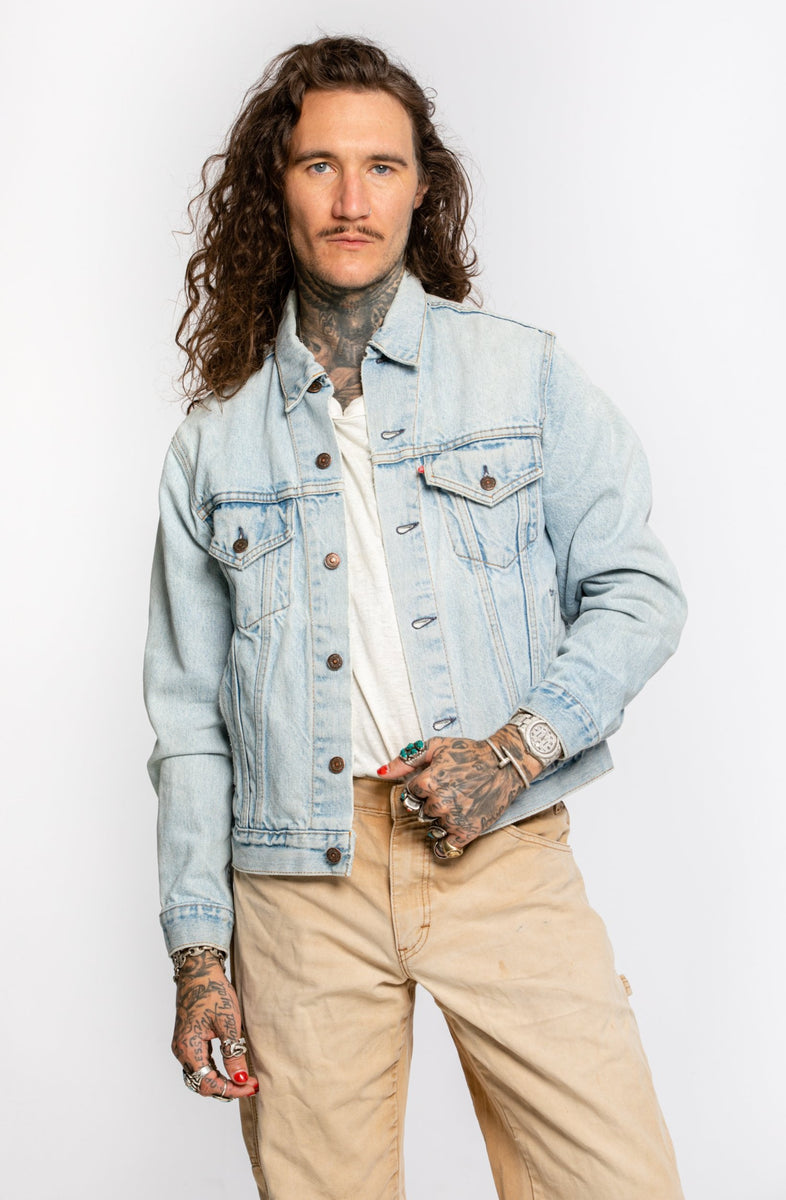 Light wash distressed denim jacket discount